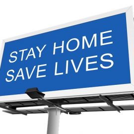 Photo of a stay at home sign