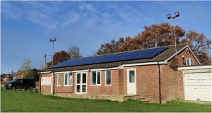 Photo of the Sports Pavilion with the solar array